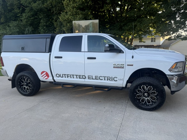 Outfitted Electric work truck with company lettering